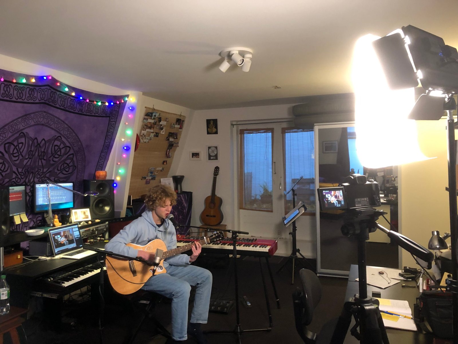Kristof rehearsing in Petra's home studio, preparing for his first Open Mic